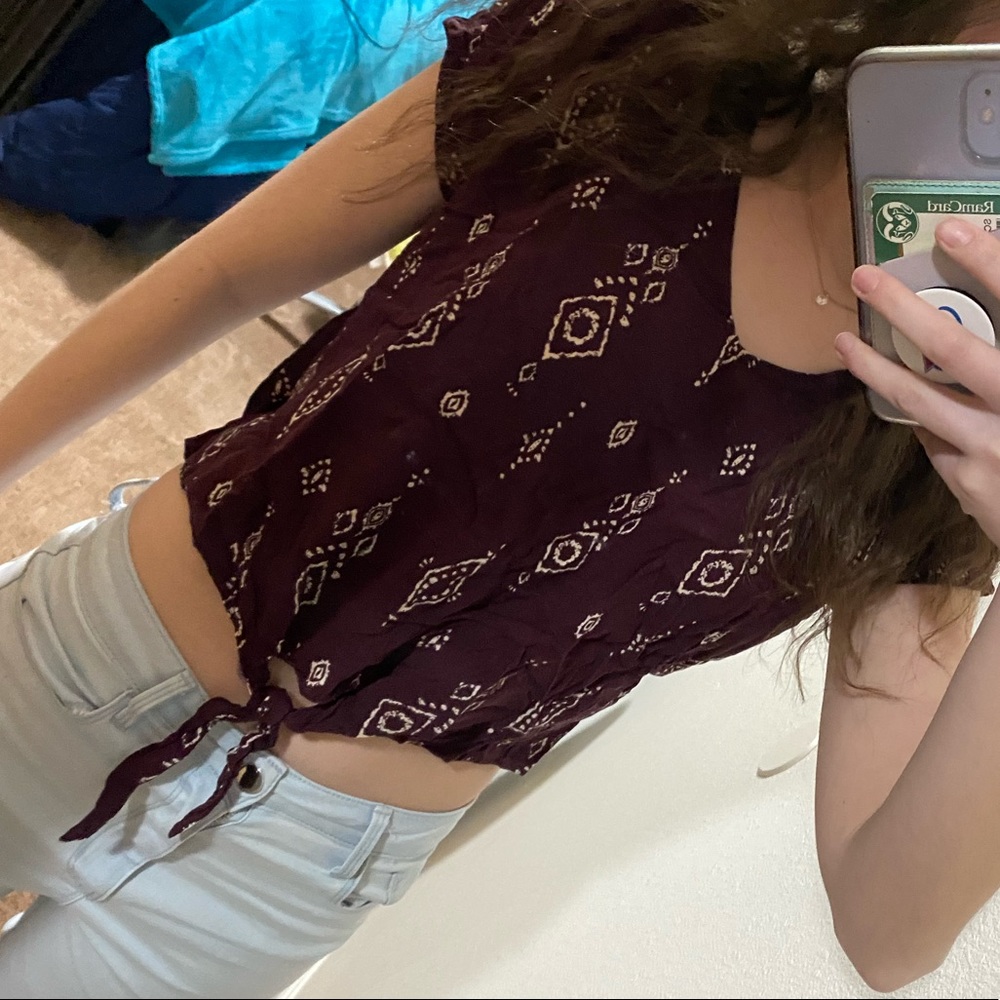 maroon top with tie